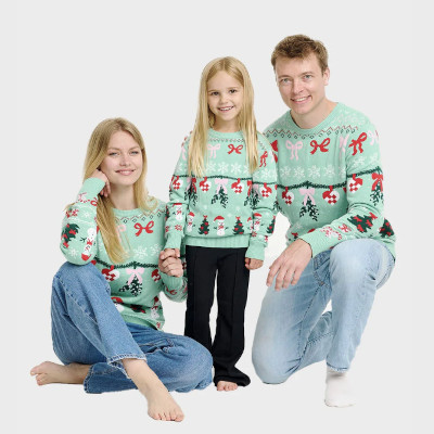 Pastellgrön jultröja med rosett